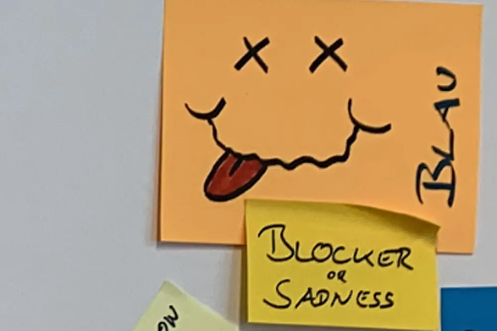 Post-it notes from a retrospective meeting